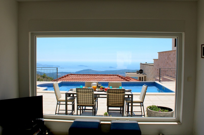 Luxury Villa Arc-A photo taken from the lounge picture-window over the terrace pool to the Dubrovnik Riviera
