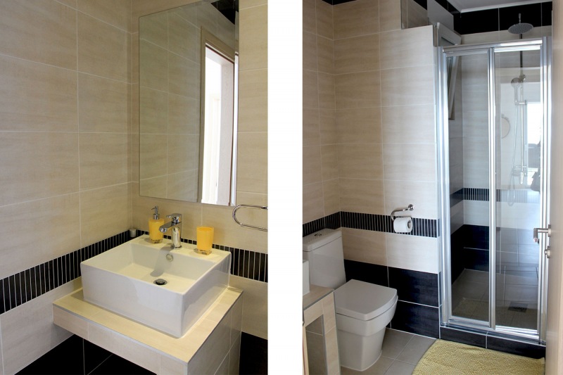 Luxury Villa Arc-Adjacent bathroom with large walk-in shower