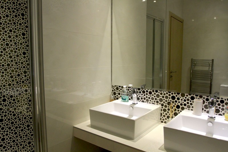 Luxury Villa Arc-En suite master bathroom with his and hers sinks and walk-in shower