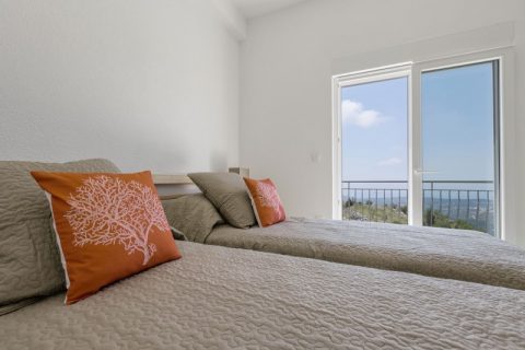Luxury Villa Ragusa-Twin room with patio doors opening to the balcony with view to the Adriatic Sea